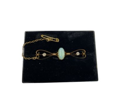 A 15ct gold Edwardian Opal and diamond bar brooch.
The brooch weighs approximately 4.6g.
Measuring approximately 4.6 cm in le