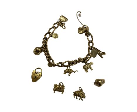 9ct 375 gold padlock charm bracelet to include 11 9ct gold charms.
Total weight is approximately 21 grammes. The safety chain