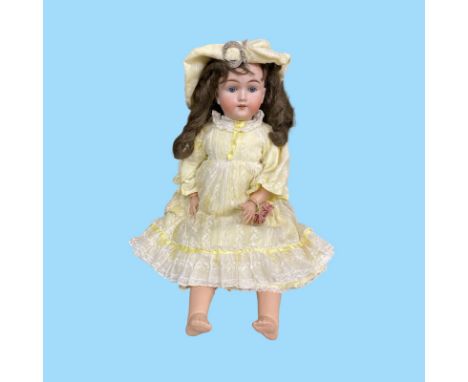 Bisque headed child doll with ball jointed composition body by Max Handwerck (Germany) Approximate height is 53 cm. Blue glas