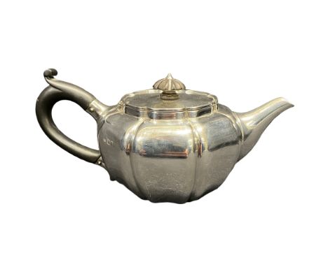 An Edwardian silver 'pumpkin' bachelors teapot, 403 grams, Joshua Vander, London 1902 Of octagonal 'pumpkin' or gourd form, w