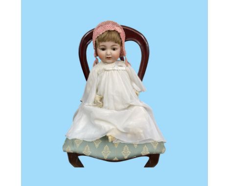 Large Bisque headed character toddler doll model number 126 by Simon and Halbig. Approximate height is 75 cm. With fixed limb