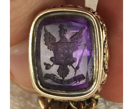 A Regency period circa 1830 gold and amethyst fob, bearing the Villiers family coat of arms.
Unmarked, testing as 15ct gold, 
