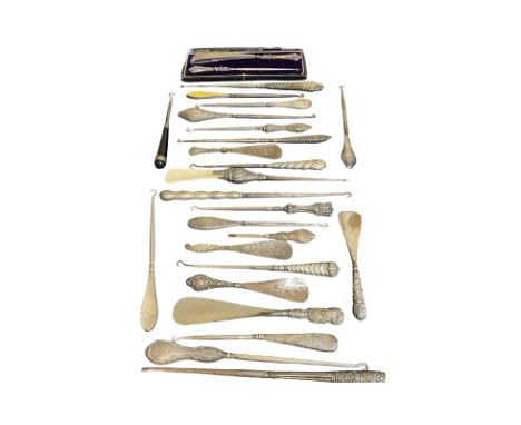 Twenty plus silver handled button hooks including a cased pair, together with a large collection of vintage/ antique advertis
