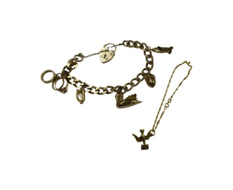 9ct padlock charm bracelet.
with an the addition of a fine 9ct gold bracelet and loose 9ct gold bird charm.
Total approximate