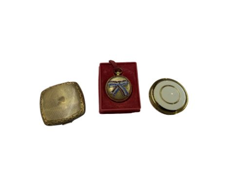 Three vintage compacts to include: A Max Factor rhinestone patriotic compact with pressed powder in the shape of a pocket wat