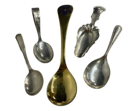 Five assorted silver spoons to include a Georg Jensen spoon and three caddy spoonsplus a Japanese silver baby feeder spoon. G