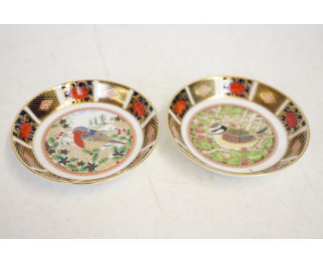 Royal crown derby 1998 first edition blue tit pin tray together with old Imari Christmas robin pin tray 