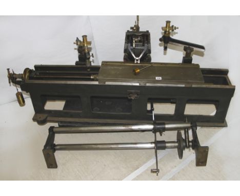 A large heavy steel 19C linear dividing engine with attachments as illustrated. Together with various instructions (some phot