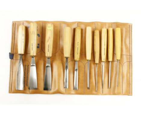 An unused set of 10 ash handled carving tools stamped Swiss Made by PFEIL in orig roll F
