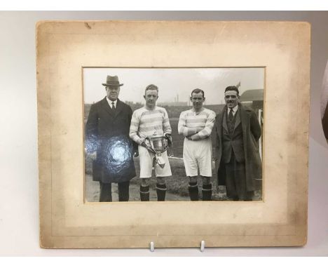 CELTIC F.C., PHOTOGRAPH OF JIMMY McGRORY AND WILLIE MALEY, CIRCA 1920s McGrory holding the Scottish Cup, mounted, along with 