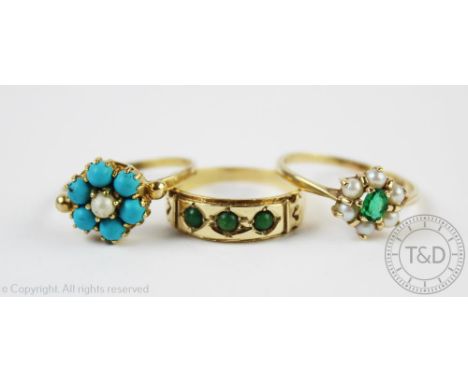 A three stone turquoise set ring in 9ct gold, a turquoise coloured and untested pearl set circular cluster ring in 9ct gold a