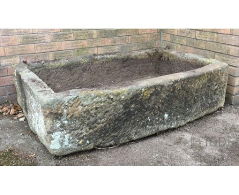 A 19th century carved stone garden trough, with bow front and dressed sides, 34cm H x 138cm W x 87cm D