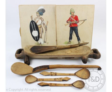 A South African Zulu carved softwood meat platter, 54cm, with five Southern African spoons and two Zulu interest prints (8)