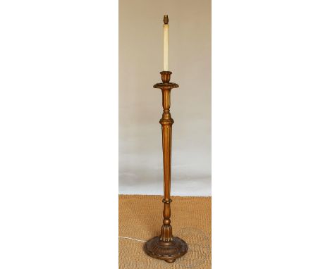 A gold painted standard lamp, modelled as an altar stick, 152cm H   CONDITION REPORT:  Lighting lots are sold as decorative i