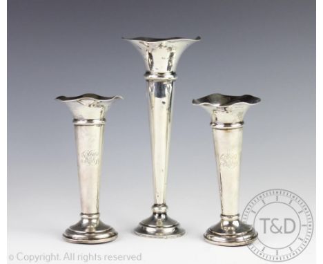 A pair of Edwardian silver posy vases, Boots Pure Drug Company, Birmingham  1907, of trumpet shape with crimped rims, initial