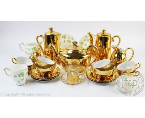 A set of six Bavarian tea cups and saucers with gilt detailing, a selection of Royal Worcester gilt tea and coffee wares, a B