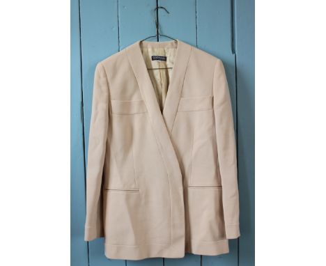A collection of ladies fashion garments to include a two Giorgio Armani jackets in peach and ivory, an Alex &amp; Co green ve