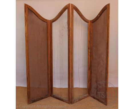 A vintage travelling trunk, with a pair of arched screens, a panelled screen, a wall clock, three mahogany chairs and a 1920'