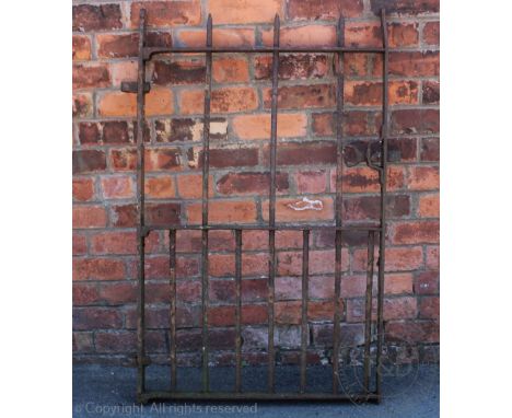 A late 19th century wrought and cast iron garden gate, 188cm x 73cm (size not including hinges)