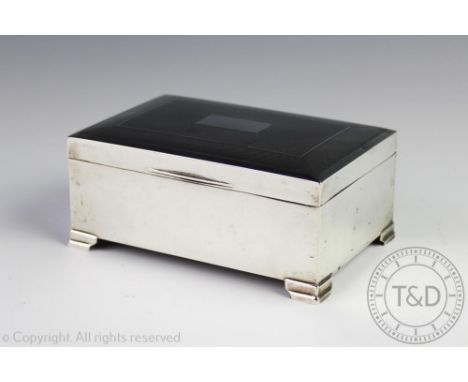 A silver cigarette box, Francis Howard Ltd, Birmingham 1972, of rectangular form with engine turned cover, 13cm wide  CONDITI