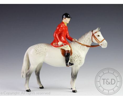 A Beswick huntsman on dapple grey hunter, 21cm high  CONDITION REPORT: Two very small glaze chips to base rim of each back ho