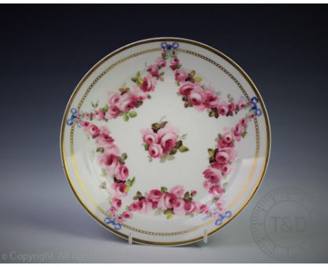 A Swansea porcelain plate, painted with a central sprays and five bow tied swags of pink roses within a gilt rim, impressed '