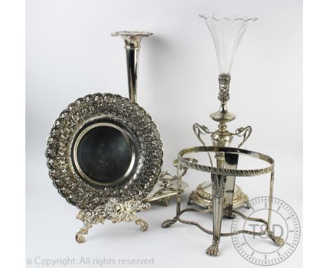 A Middle East white metal dish, repousee decorated with flowers, 30.5cm diam, with a white metal easel stand, a WMF epergne c