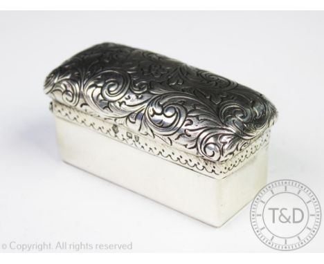 A Victorian silver box, George Betjemann & Sons, London 1894, the cushion shaped lid decorated with scrolling acanthus leaves