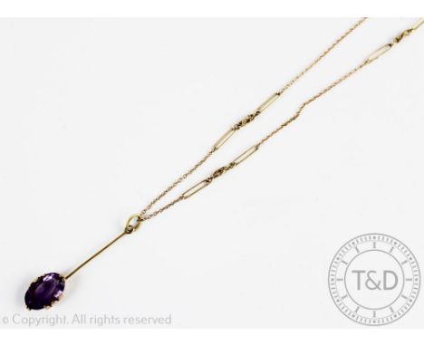 An amethyst pendant, designed as a central drop set with an oval, mixed cut amethyst (of approx 4.60ct), suspended from a bar