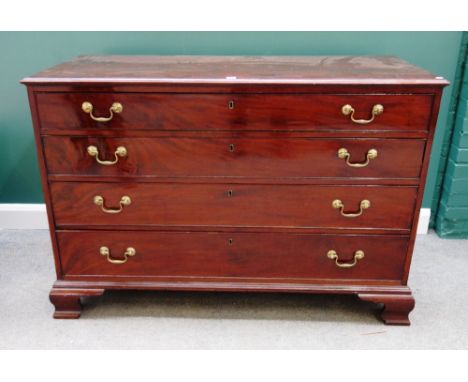 A George III mahogany chest of four long graduated drawers, on ogee bracket feet, 141cm wide x 95cm high.