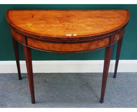 A George III kingwood banded satinwood semi-elliptic card table on tapering square supports, 100cm wide x 71cm high. 