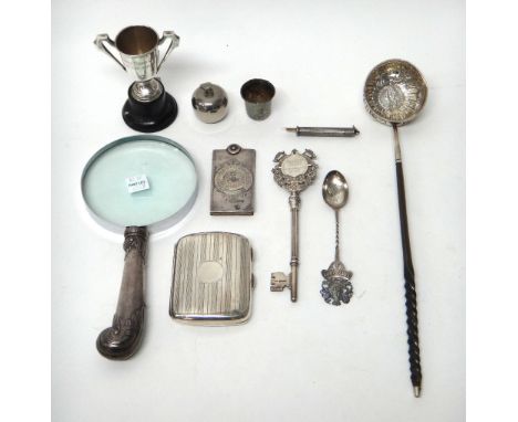 Mostly silver and silver mounted wares, comprising; a toddy ladle, the bowl mounted with a George II shilling and with a twis