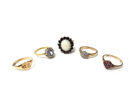 A 9ct gold, opal and sapphire set oval cluster ring, an 18ct gold, diamond and sapphire set oval cluster ring, a 9ct gold and