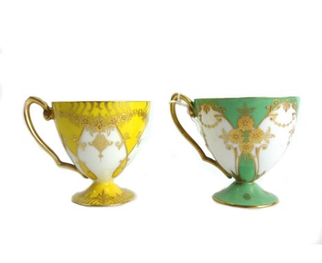 A Royal Worcester matched part service of gilt cabinet cups and saucers, circa 1934, green/ yellow with internal gilding and 