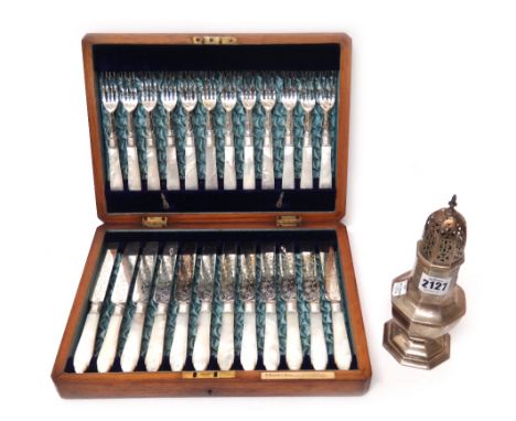 A silver sugar caster, of octagonal baluster form, Sheffield 1902, weight 176 gms and a set of twelve pairs of plated dessert