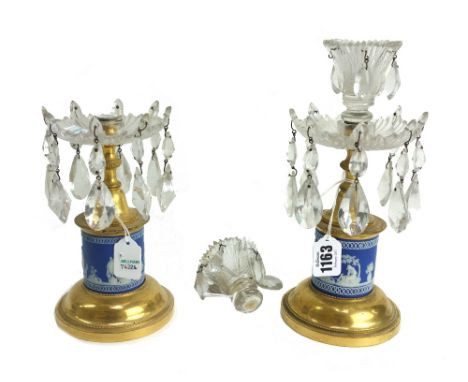 A pair of Wedgwood jasper ware brass and glass mounted candlestick lustres, 19th century, the shaped eight point drip pan hun