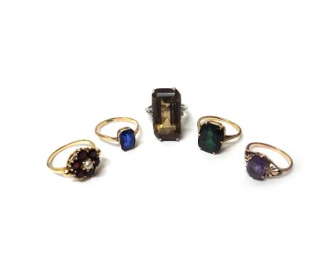 A gold, garnet and cultured pearl set cluster ring, detailed 9 CT and four further gem set single stone rings, (5).