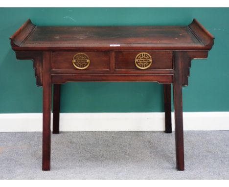 A 20th century Chinese hardwood two drawer altar table, 103cm wide x 84cm high.