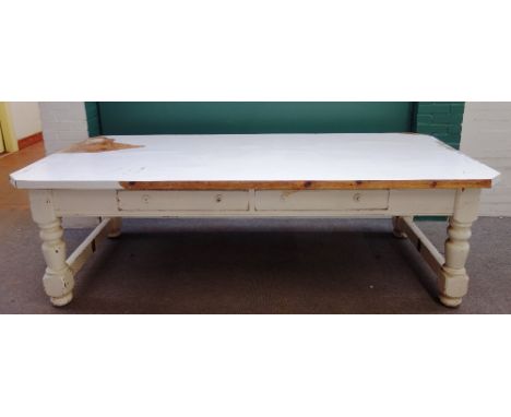 C. Wilson 1918, an early 20th century white painted pine country house scullery table, with four frieze drawers, on turned su