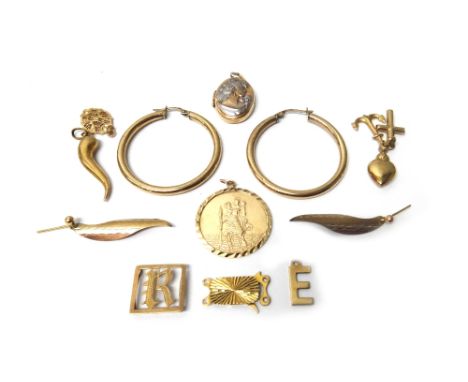 A gold pendant detailed '18K ITALY', 1.4gms, mostly 9ct gold jewellery, comprising; a St Christopher pendant, an oval pendant