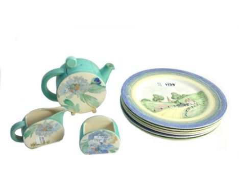 A set of six Clarice Cliff Bizarre 'Crayon' plates, each decorated with a paste/crayon scene (23cm diameter) and a Clarice Cl