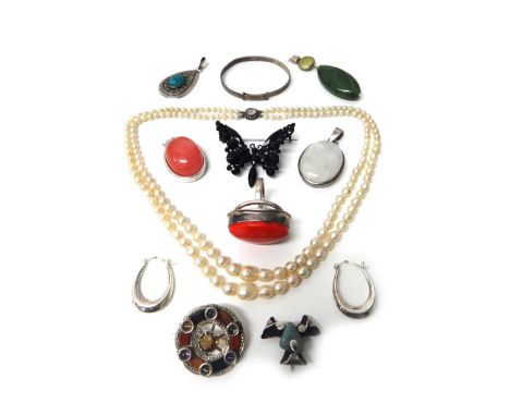 A two row necklace of graduated cultured pearls, a silver mounted agate and gem set brooch, probably Scottish, circa 1926, tw
