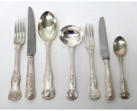 Silver King's pattern table flatware, comprising; six tablespoons, six table forks, five dessert forks and a pair of sauce la