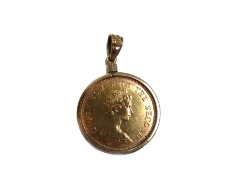 A Hong Kong gold one thousand dollars 1975, commemorating The Royal Visit, in a gold pendant mount, the top detailed 18 K, ca