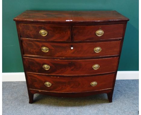 A Regency mahogany bowfront chest of two short and three long graduated drawers, on splayed bracket feet, 105cm wide x 104cm 