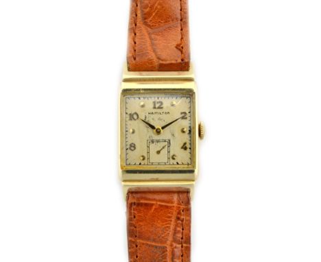 A Hamilton gold rectangular cased gentleman's wristwatch, the signed silvered dial with alternating gilt Arabic and dot numer