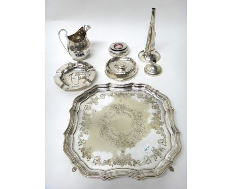 Silver and silver mounted wares, comprising; a George III helmet shaped milk jug, London 1802, a circular ashtray, Sheffield 