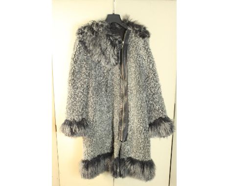 A vintage ladies Mary Quant grey zip up Astrakhan coat. Mary Quant label to the interior. Under arm to under arm measurement 