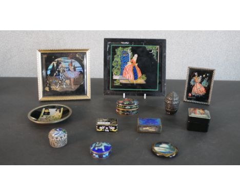 A collection of enamel boxes, butterfly wing plaques and Russian boxes. H.15 W.16.5cm (largest) 