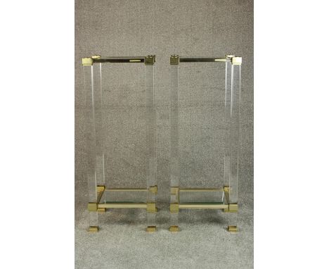 A pair of Pierre Vandel, Paris perspex side plant tables with a brass and chrome frame and two bevelled glass plates. Maker's